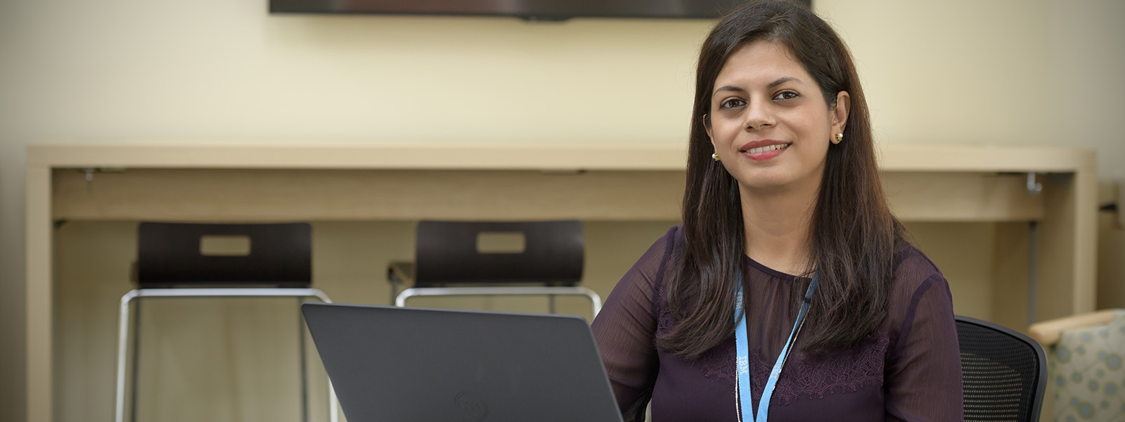 Student-Sambhavi-Parajuli-sitting-in-front-of-laptop