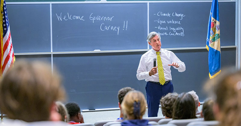 Delaware Gov. John Carney speaks before high school students